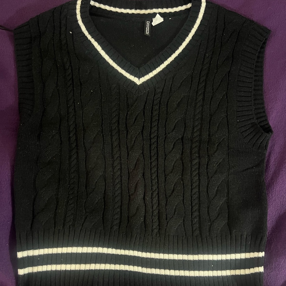 Black with white striped vest